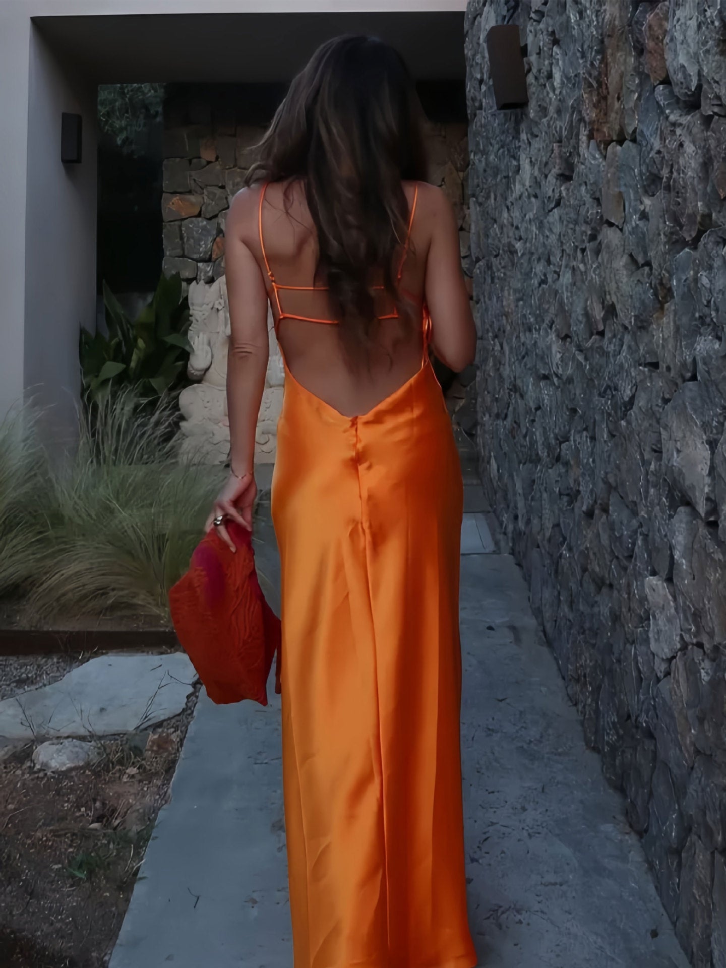 New French-style summer fresh satin slip dress with delicate spaghetti straps and a deep V-neck for an elegant look